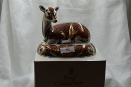 A Royal Crown Derby Collectors Guild Deer paperweight, boxed with gold stopper