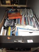 A selection of 45 rpm singles and cassettes