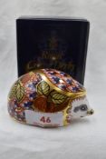 A Royal Crown Derby Collectors Guild Orchard Hedgehog paperweight, boxed with gold stopper