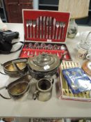 A cased canteen of cutlery by Sheffield stainless steel and plated part tea set