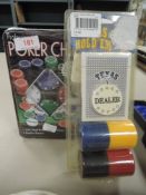 Two sets of poker chips in packaging.