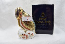 A Royal Crown Derby Kingfisher paperweight, boxed with gold stopper