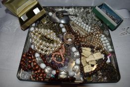 A tray of costume jewellery including Rosary beads, SOS pendant, simulated pearls etc