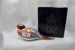 A Royal Crown Derby Pheasant paperweight, boxed with gold stopper