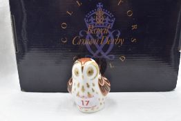 A Royal Crown Derby Collectors Guild Owlet paperweight, boxed with gold stopper