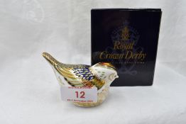 A Royal Crown Derby Firecrest paperweight, boxed with gold stopper