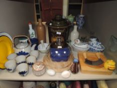 A selection of kitchen wares including cheese dome large Rumtopf and chopping board