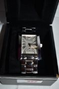 A gents steel wrist watch by Emporio Armani having a Roman numeral dial with subsidiary seconds to