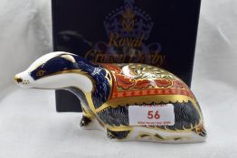 A Royal Crown Derby Moonlight Badger paperweight, boxed with gold stopper