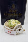 A Royal Crown Derby Collectors Guild Primrose Hedgehog paperweight, boxed with gold stopper