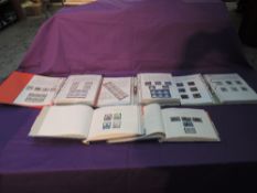 A collection of GB Mint Stamps in two albums and three binders, 1960's to 2008