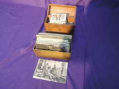 A small collection of Cigarette and Trade Cards and early French Postcards including WW1 cards