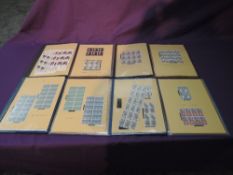 A collection in four binders of GB Commemorative Mint Stamps in blocks, 1966-1990