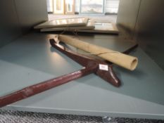 A small naive native crossbow and arrow in quiver