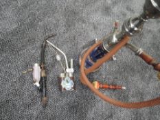 Two opium pipes one European design and similar Chinese style and Turkish hookah