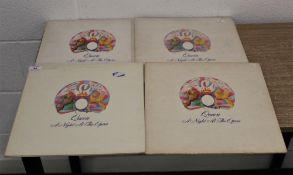 Four copies of 'A night at the opera'.