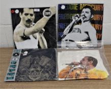 A selection of five Queen T shirts,mixed sizes.