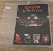 An 'It's a kind of magic' tour book, out of print.