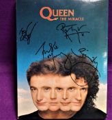 A promo set for Queen's The Miracle - rare with all 4 signatures including Freddie Mercury - was