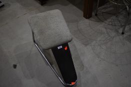 A vintage chrome chrome shop display and shoe fitting stool