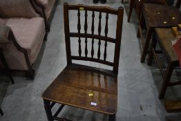 A period oak spinde back chair having solid seat and turned frame