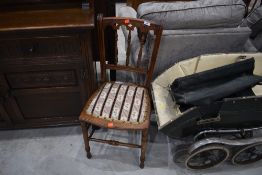 A Victorian mahogany bedroom chair with woolwork seat