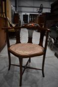 An Edwardian corner chair