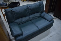 A modern green leather settee, width approx. 158cm