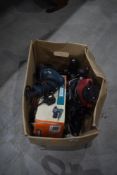A box of assorted power tools
