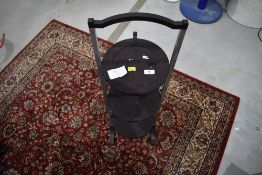 A vintage aluminium frame and phenolic cake stand