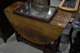 A traditional oak gateleg table