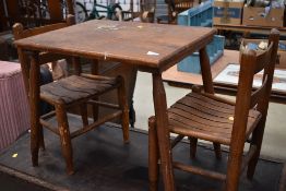 A vintage stained frame childs table and pair of similar chairs, table approx. 60 x 47cm, height