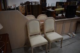 A modern octagonal table chairs and sideboard, gloss finish limed oak and peach effect, sideboard