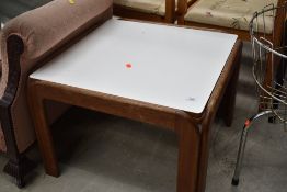 A vintage square coffee table