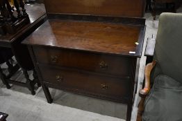 An early 20th Century dark oak bedroom chest of two drawers