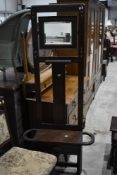 An early 20th Century dark oak hall stand