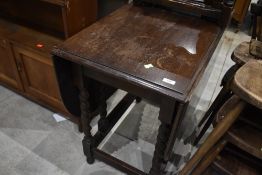 A mid 20th Century oak twist gateleg table, width closed 50cm