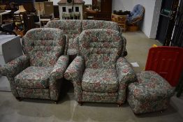 A traditional three piece suite and footstool, very clean, looks nice quality
