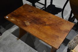 A rustic coffee table, part pine, in the refectory style, with heart motifs to ends, approx. 92 x