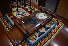 A 19th Century wall clock in marquetry work case