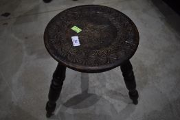 A 19th Century stained frame carved milking type stool