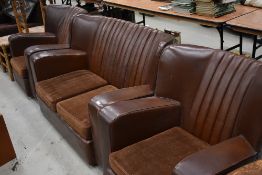 A 1930s brown leather or rexine three piece suite in classic art deco style