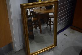 A large gilt frame wall mirror, chip to gilt on one side, approx. 75 x 107cm