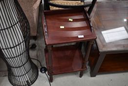 A modern mahogany effect bedside table