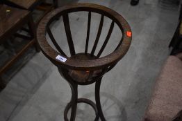 An early 20th Century oak plant stand, height approx. 96cm