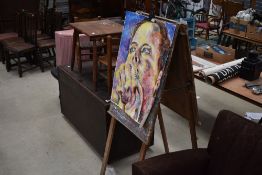 An artists easel and painting