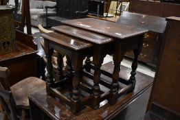 A nice quality reproduction oak nest of three tables, probably Titchmarsh and Goodwin or similar ,