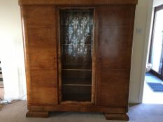 A vintage German walnut cupboard, labelled Pasche, having central display section, has been dismantl