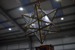 A mouth watering brass vintage style ceiling light of star burst form, make a lovely Christmas