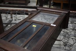 An early 20th Century oak cased wall clock